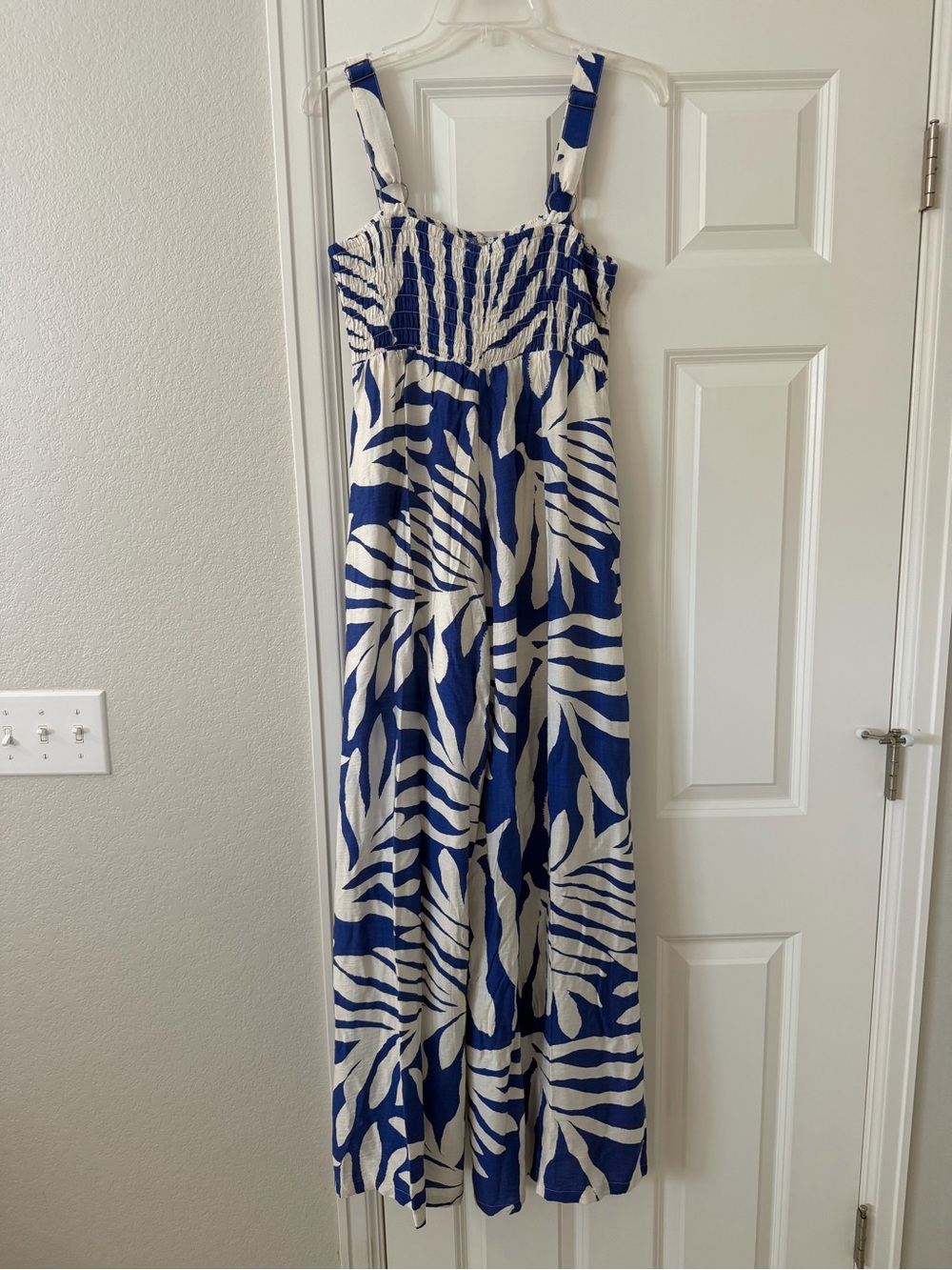 Doe & Rae Blue and White Tropical-Print Smocked Jumpsuit